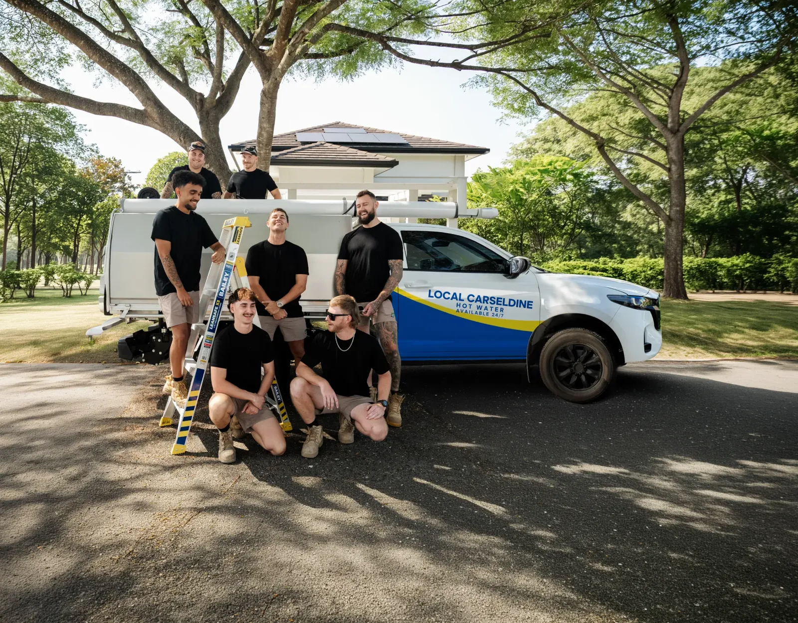 Local Carseldine Hot Water ute and team